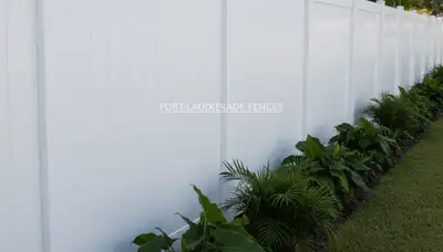 White wooden privacy fence installation by Chop Chop Landscaping in Fort Lauderdale, FL